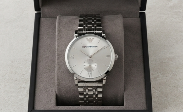 Emporio Armani Gianni T-Bar — Stainless Steel Case with Silver Sunray Dial, Small Seconds Sub-Dial, Roman Numeral Indices, and Multi-Row Steel Bracelet Hover