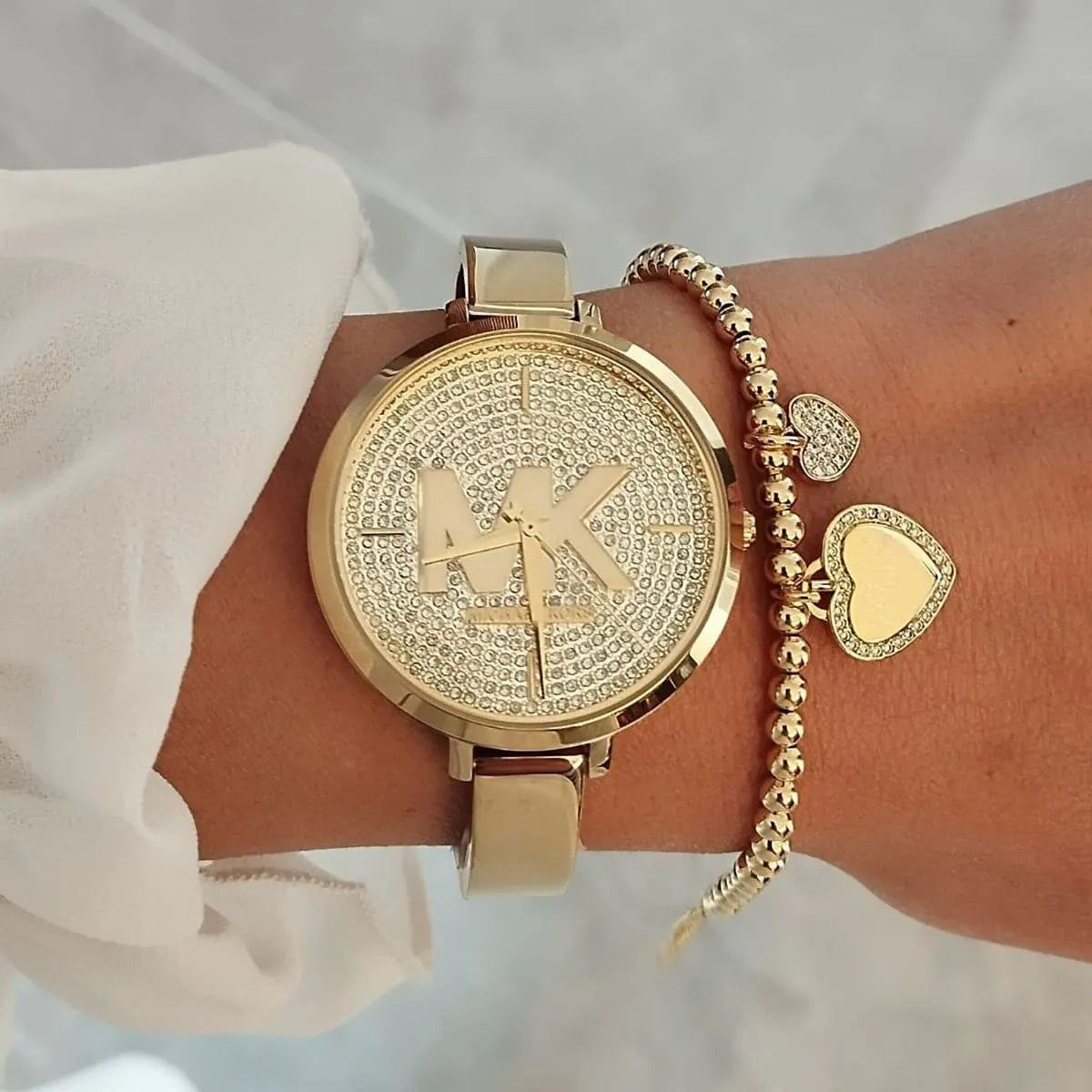Michael Kors Pyper / Logo Pavé Bangle Watch (Gold-Tone Stainless Steel Case with Full Pavé Crystal Dial, Giant MK Logo, and Solid Bangle Strap) Gallery