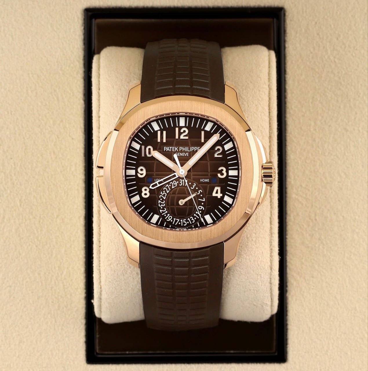 Patek Philippe Aquanaut Travel Time (18k Rose Gold Edition, Ref. 5164R-001) — 18k Rose Gold Case with Brown Embossed Dial, Dual Time Zone Display, Date Sub-Dial, and Dark Brown Composite Strap Hover