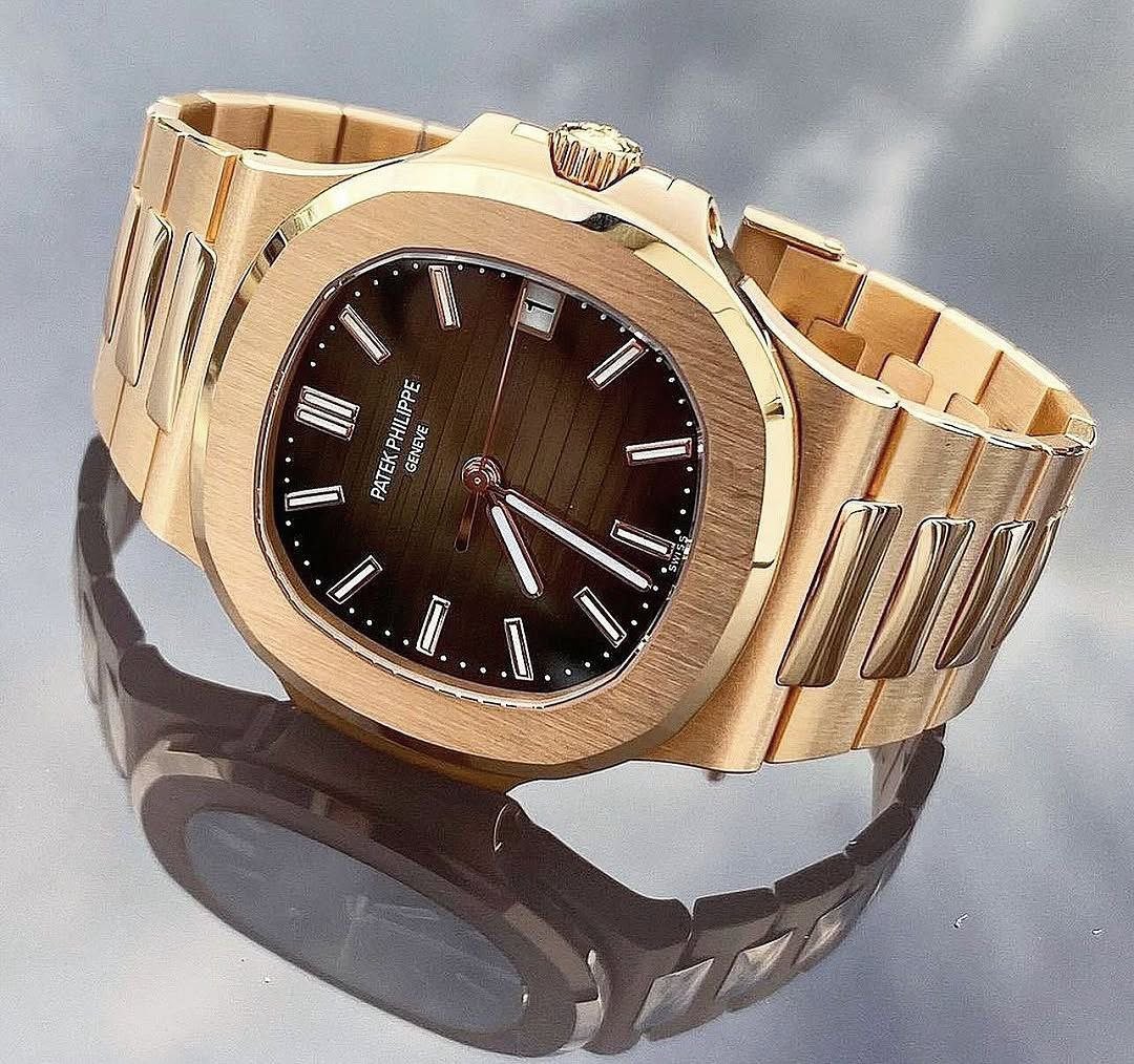 Patek Philippe Nautilus Reference 5711/1R — 18k Rose Gold Case with Graduated Brown Sunburst Dial and Integrated Rose Gold Bracelet Gallery