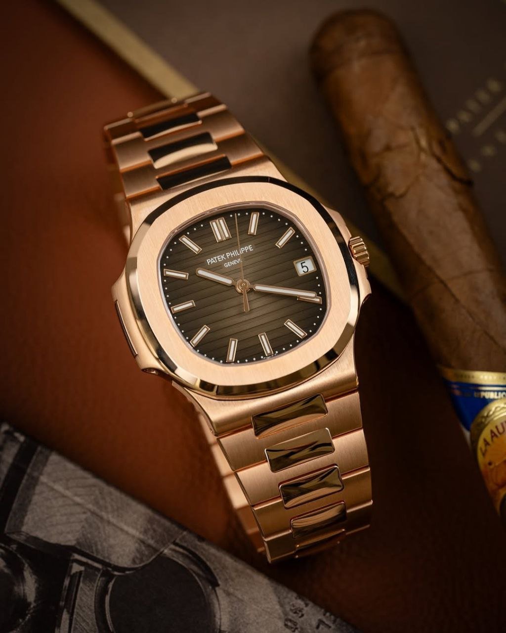 Patek Philippe Nautilus Reference 5711/1R — 18k Rose Gold Case with Graduated Brown Sunburst Dial and Integrated Rose Gold Bracelet Gallery