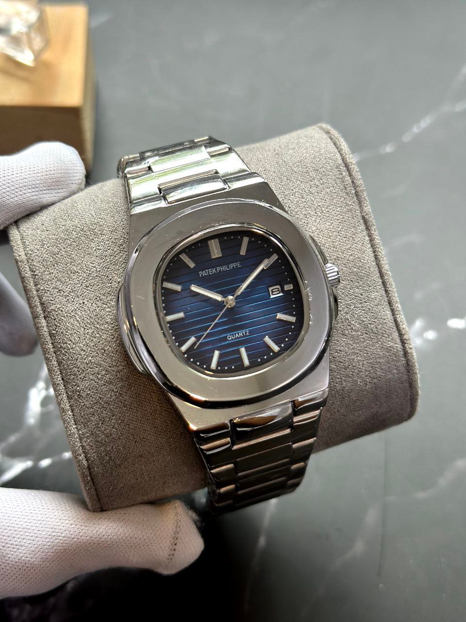 Patek Philippe Nautilus — Stainless Steel Case with Blue Gradient Dial, Horizontal Embossing, and Stainless Steel Bracelet Gallery