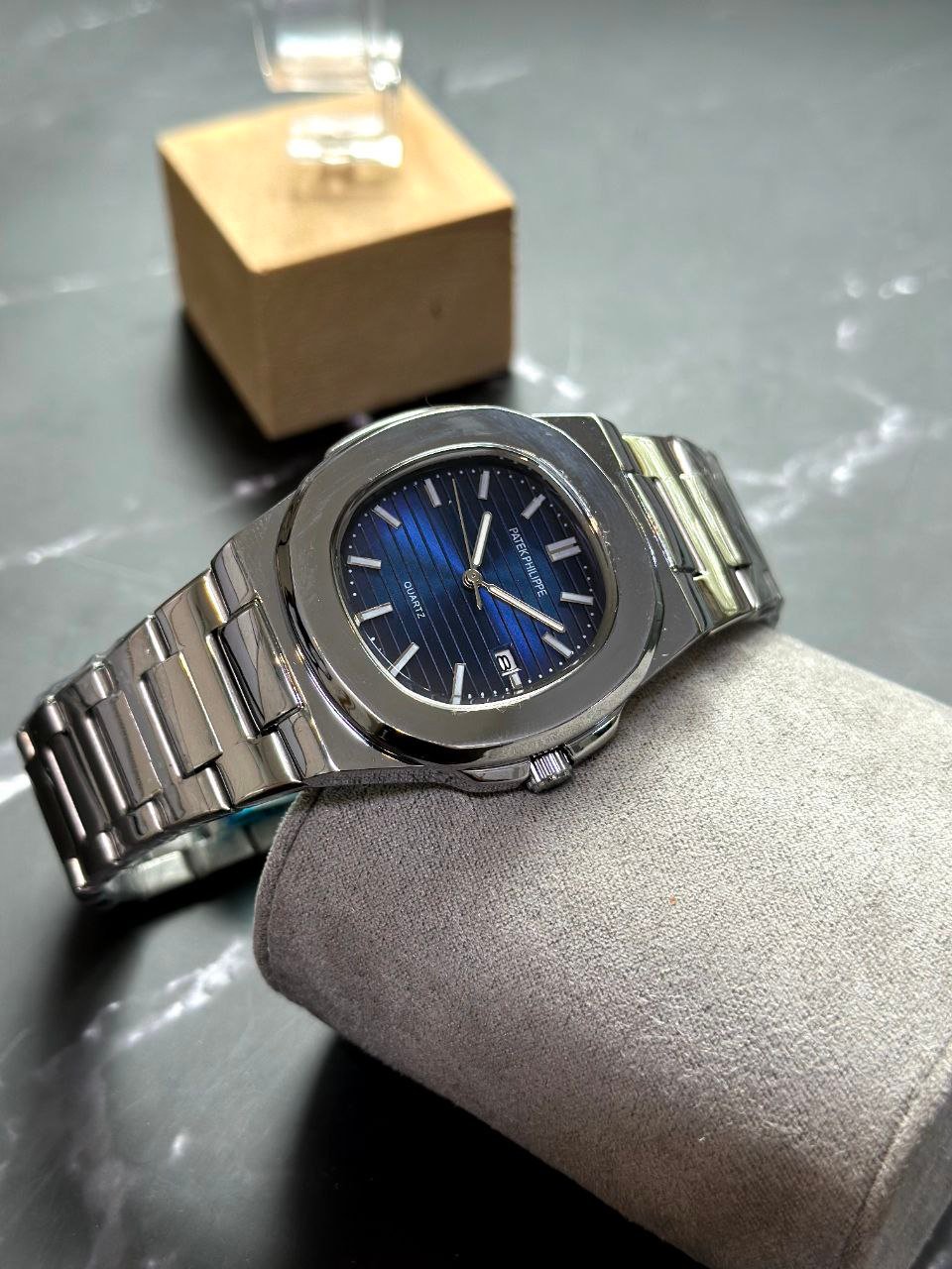 Patek Philippe Nautilus — Stainless Steel Case with Blue Gradient Dial, Horizontal Embossing, and Stainless Steel Bracelet Gallery