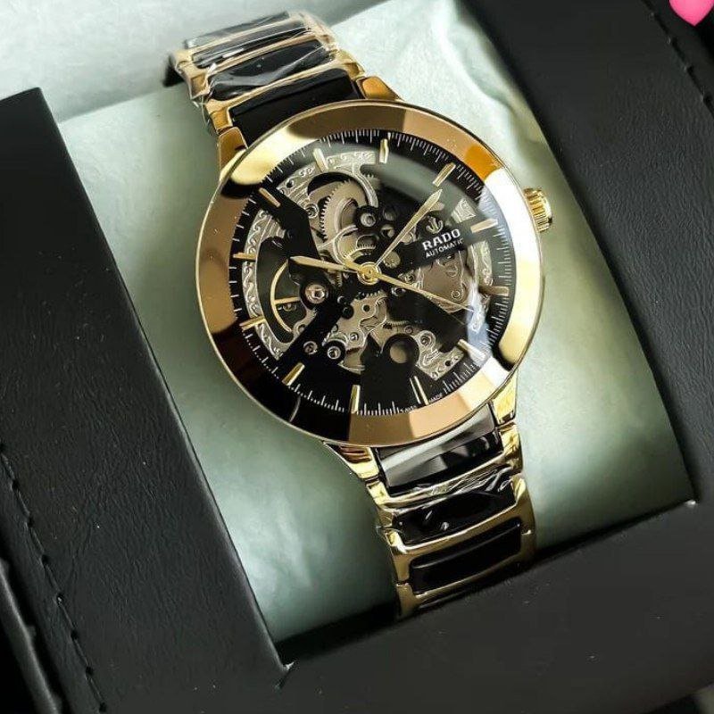Rado Centrix Open Heart Automatic (Black and Gold High-Tech Ceramic Skeleton Edition) — Similar model profile to the Rado Centrix / Open Heart series Hover