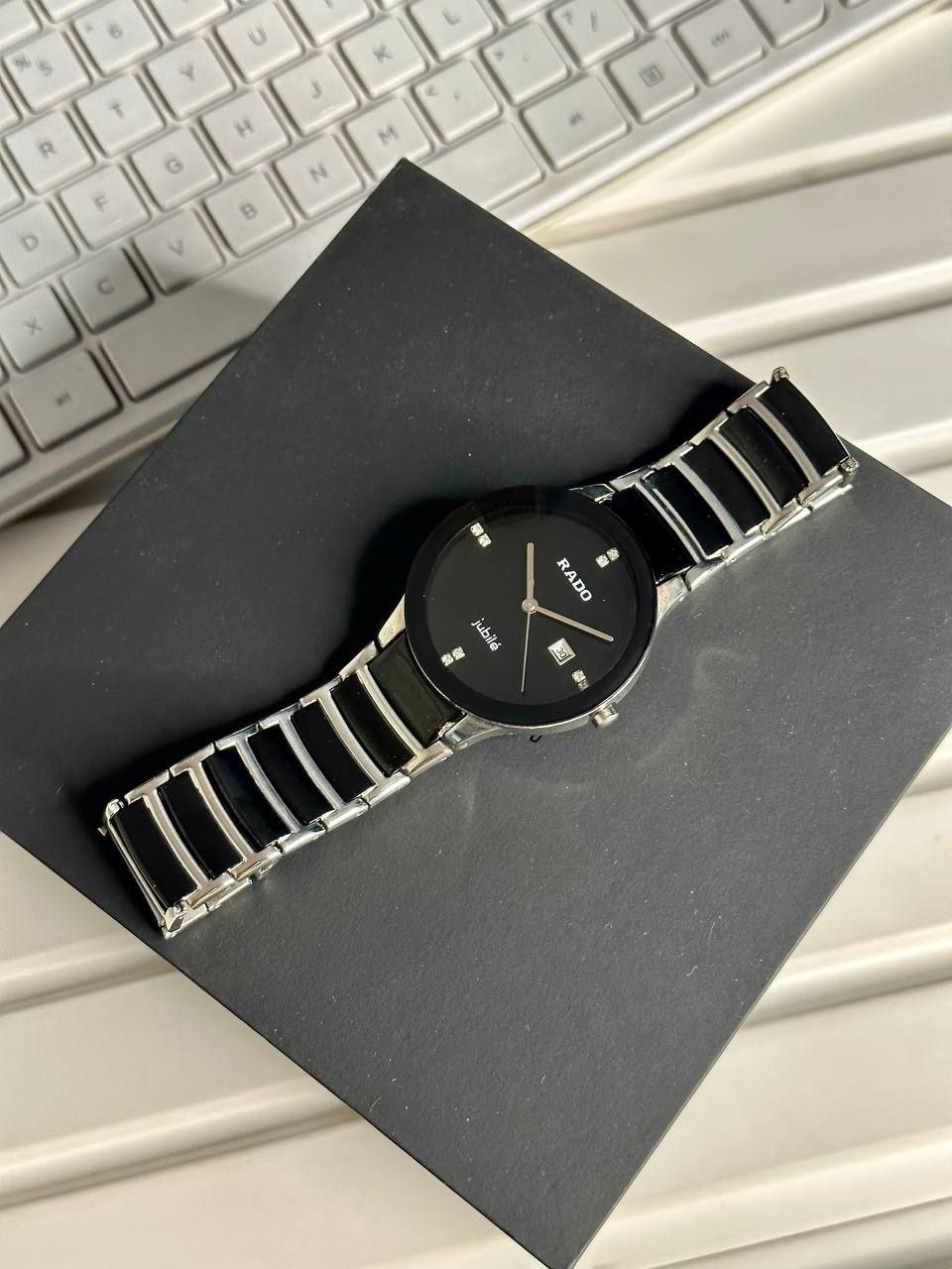 Rado Integral / Centrix Jubilé Black & Gold Edition (Black High-Tech Ceramic & Gold-Tone Case, Minimalist Glossy Black Dial with Diamond Hour Markers, Date Window, and Ceramic/Gold Link Bracelet) Gallery