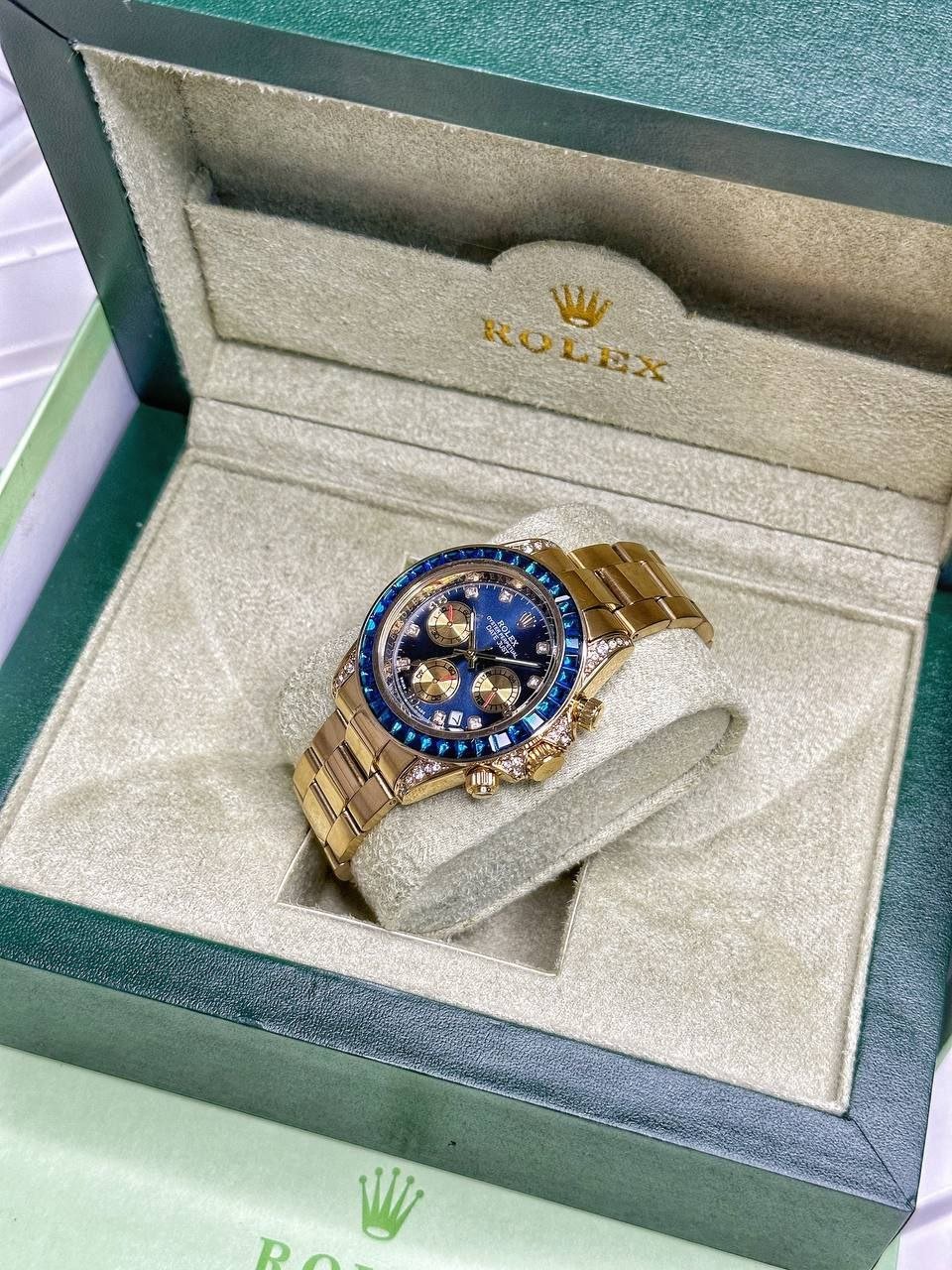 Rolex Cosmograph Daytona "Blue Sapphire & Diamond Edition" (Yellow Gold-Tone Case with Blue Sunburst Dial, Baguette-Cut Blue Sapphire Bezel, Diamond Hour Markers, Gold Sub-dials, and Oyster Link Bracelet) Gallery