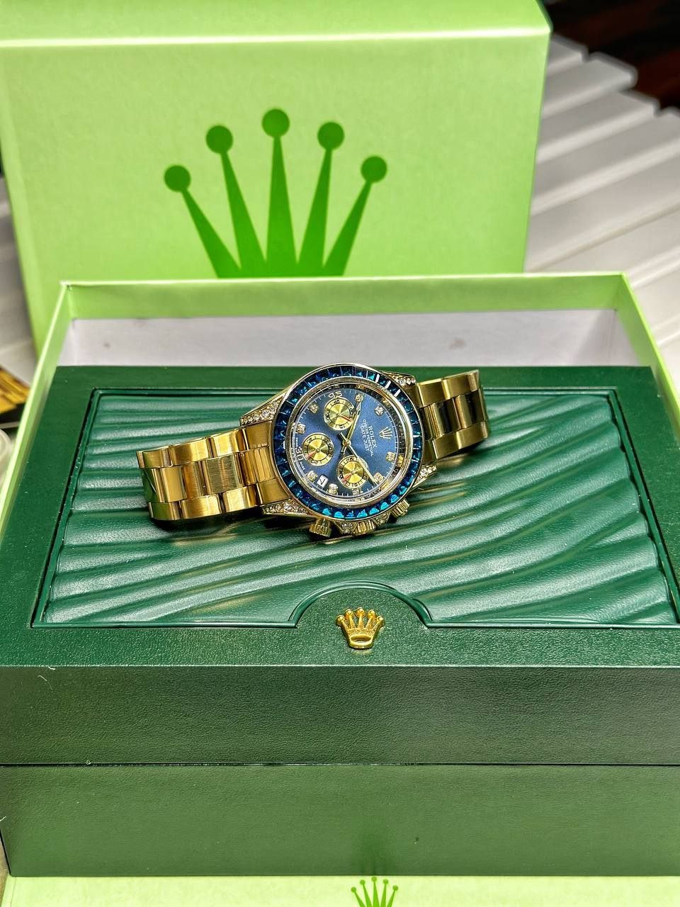 Rolex Cosmograph Daytona "Blue Sapphire & Diamond Edition" (Yellow Gold-Tone Case with Blue Sunburst Dial, Baguette-Cut Blue Sapphire Bezel, Diamond Hour Markers, Gold Sub-dials, and Oyster Link Bracelet) Gallery
