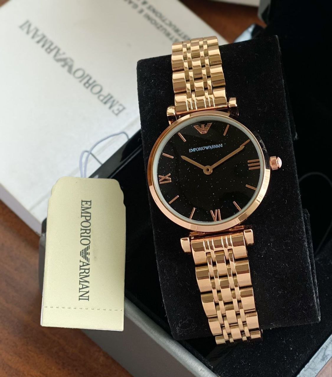 Emporio Armani Gianni T-Bar — Rose Gold-Tone Stainless Steel Case with Black Glitter Dial and Matching Bracelet