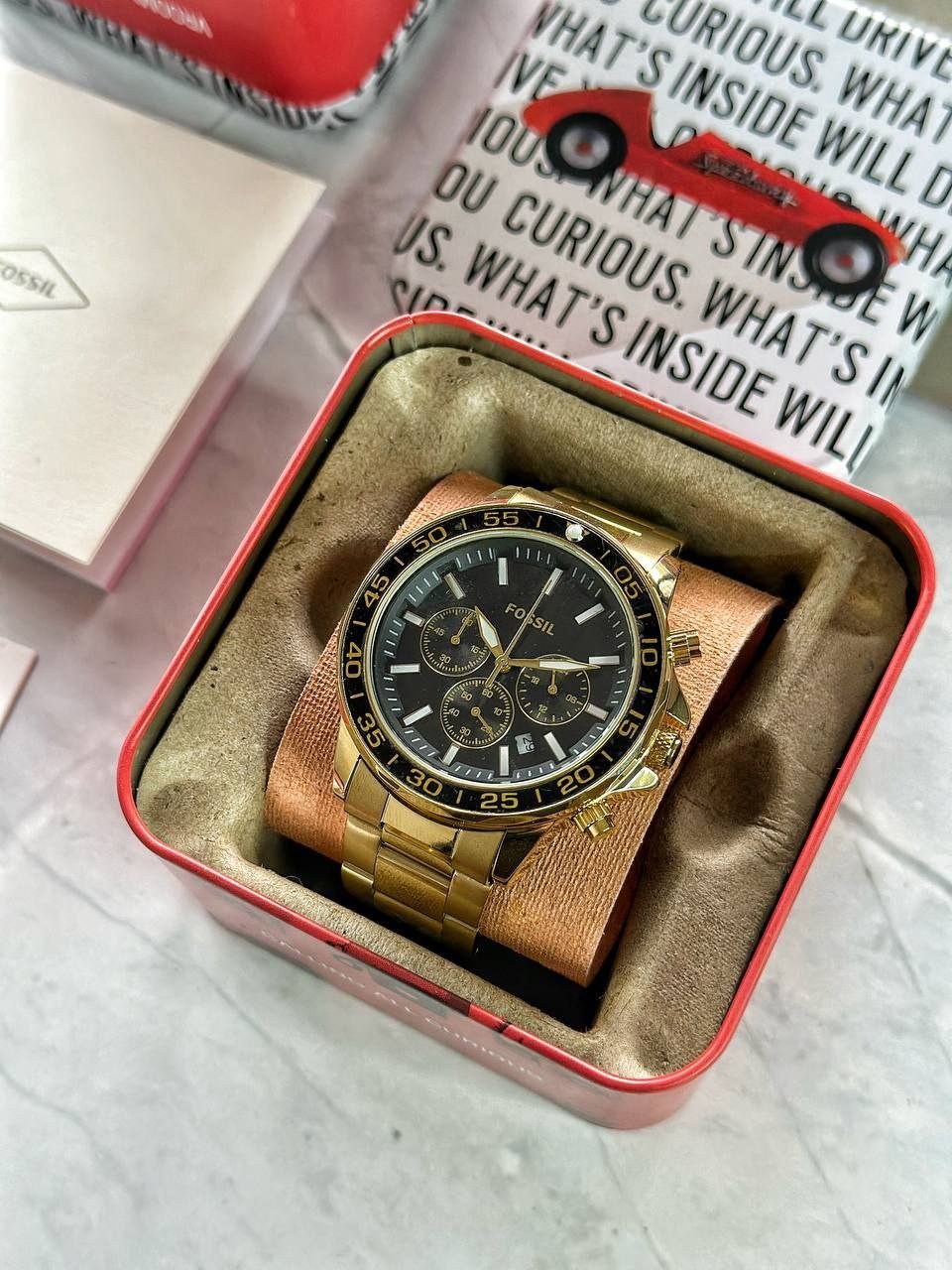 Fossil Decker Chronograph — Gold-Tone Stainless Steel Case with Black Dial and Gold Bracelet Model