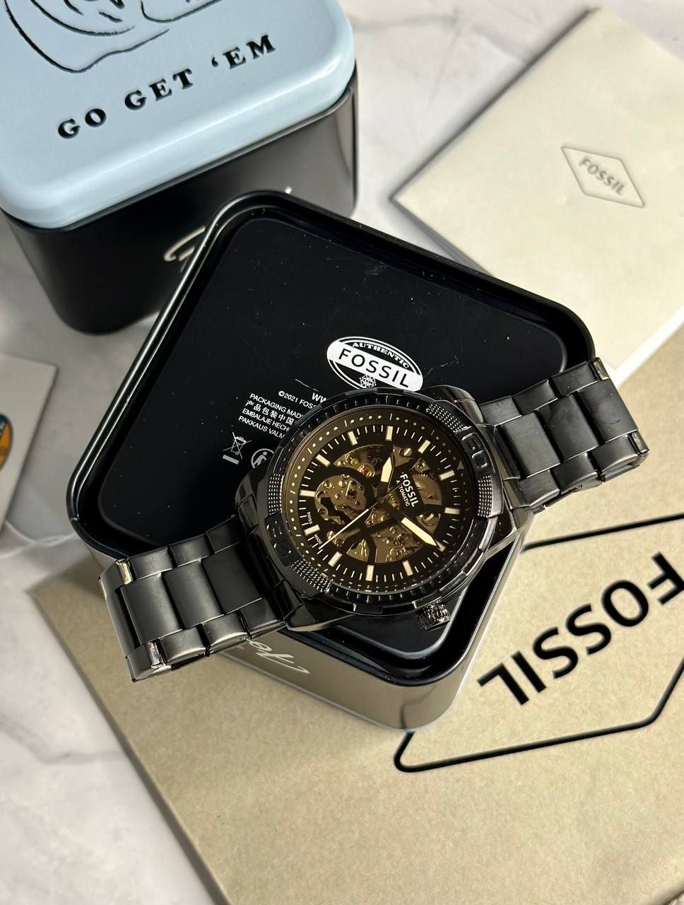 Fossil Mechanical Skeleton Watch — Black Ion-Plated Stainless Steel Case with Skeleton Dial, Exposed Automatic Movement, and Matching Black Link Bracelet