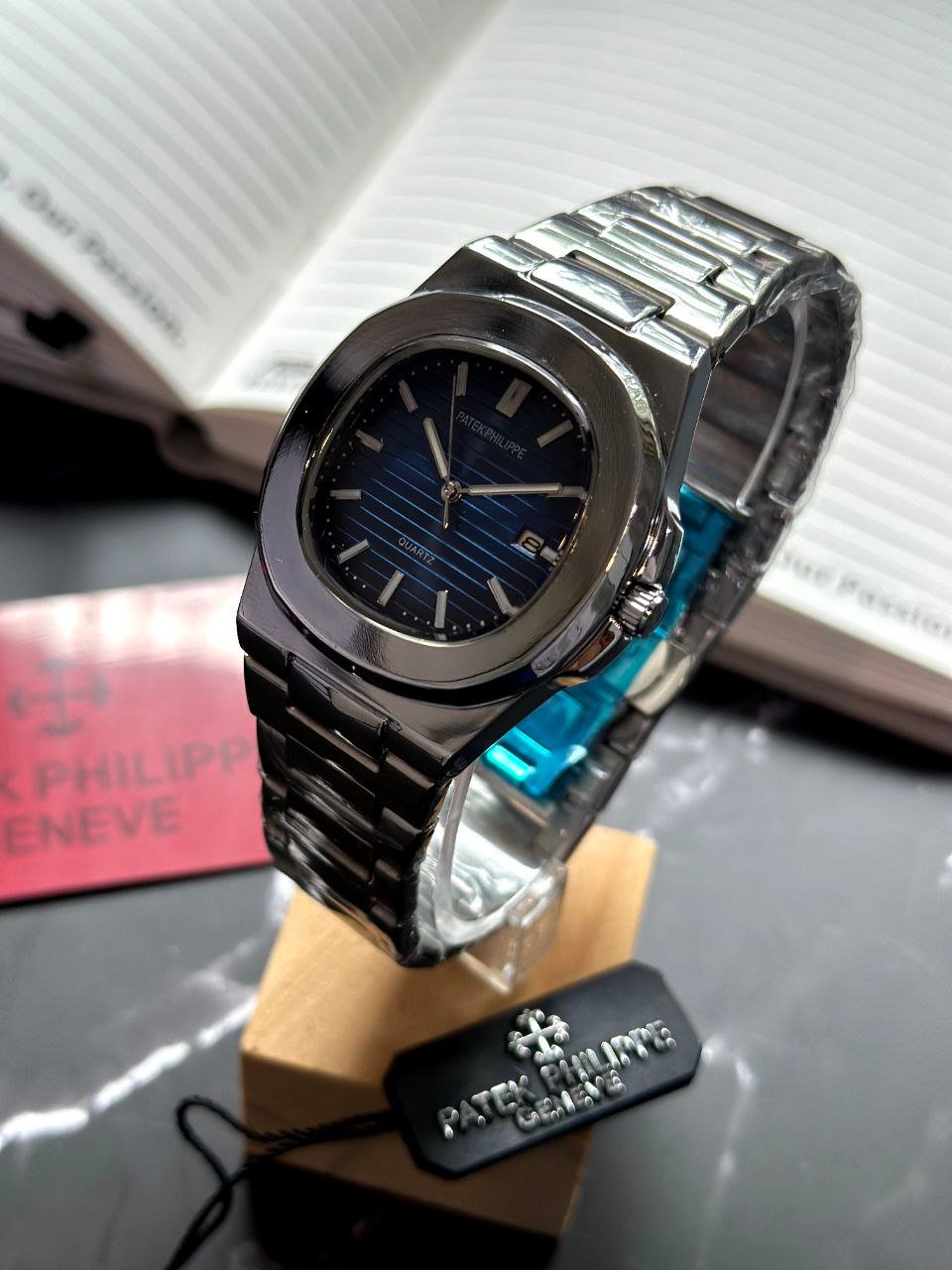 Patek Philippe Nautilus — Stainless Steel Case with Blue Gradient Dial, Horizontal Embossing, and Stainless Steel Bracelet