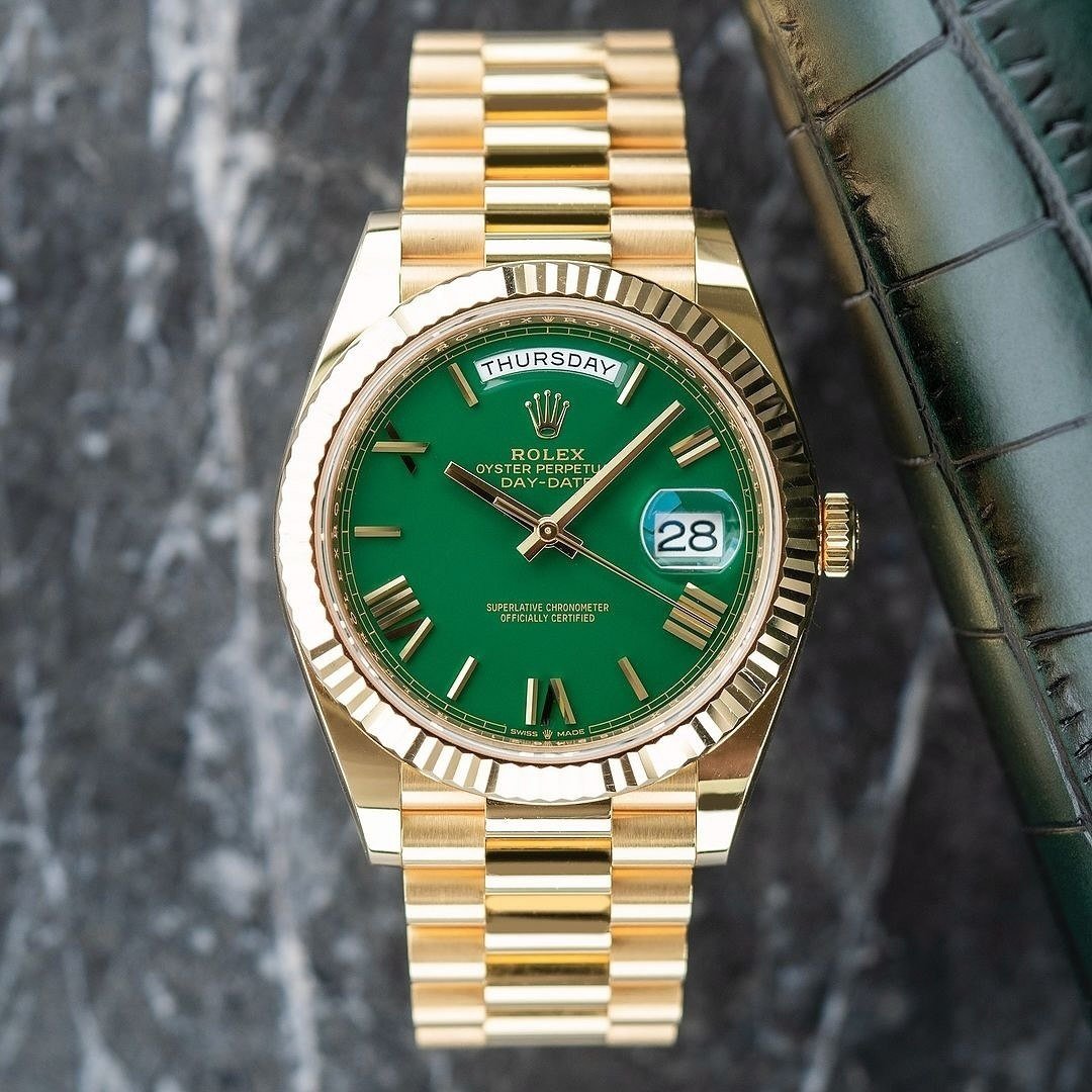 Rolex Day-Date 40 (18 ct Yellow Gold with Olive Green Dial, Ref. 228238) — 18 ct Yellow Gold Case with Fluted Bezel, Olive Green Dial with Roman Numerals, Day & Date Display, and President Bracelet