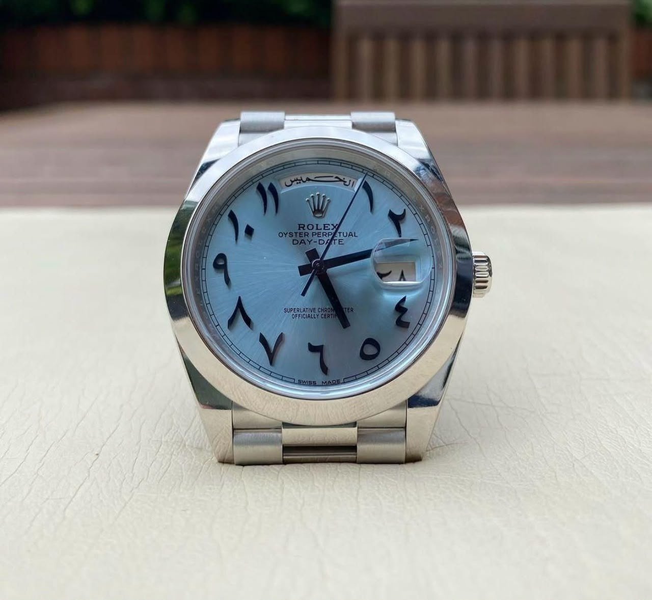 Rolex Oyster Perpetual Day-Date (Arabic Dial) — Stainless Steel / Platinum Case with Ice Blue Arabic Numerals Dial, Smooth Bezel, Day-Date Window, and President Bracelet