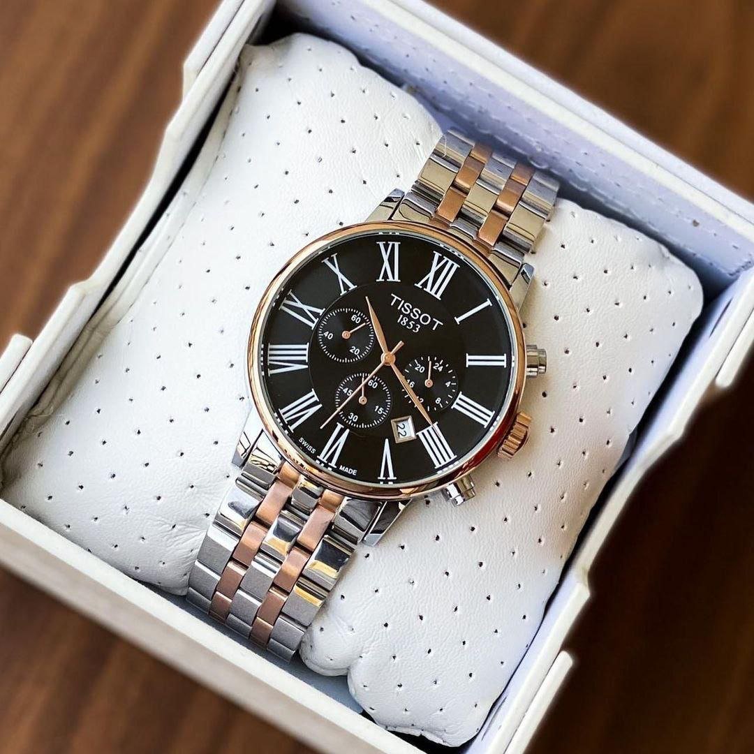Tissot Carson Premium Chronograph — Two-Tone Rose Gold and Stainless Steel Case with Black Dial, Roman Numerals, Chronograph Sub-Dials, and Two-Tone Bracelet